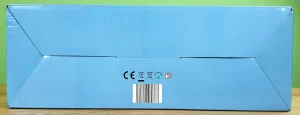 Elektrische Körperbürste in seiner Verpackung von unten.