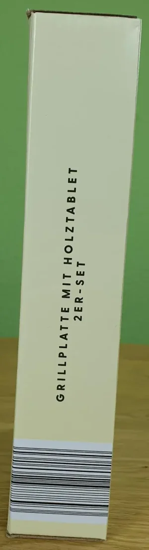 Grillplatte mit Holzbrett 2er-Set in klein von Nelson Müller in Ihrer Verpackung von der Seite.