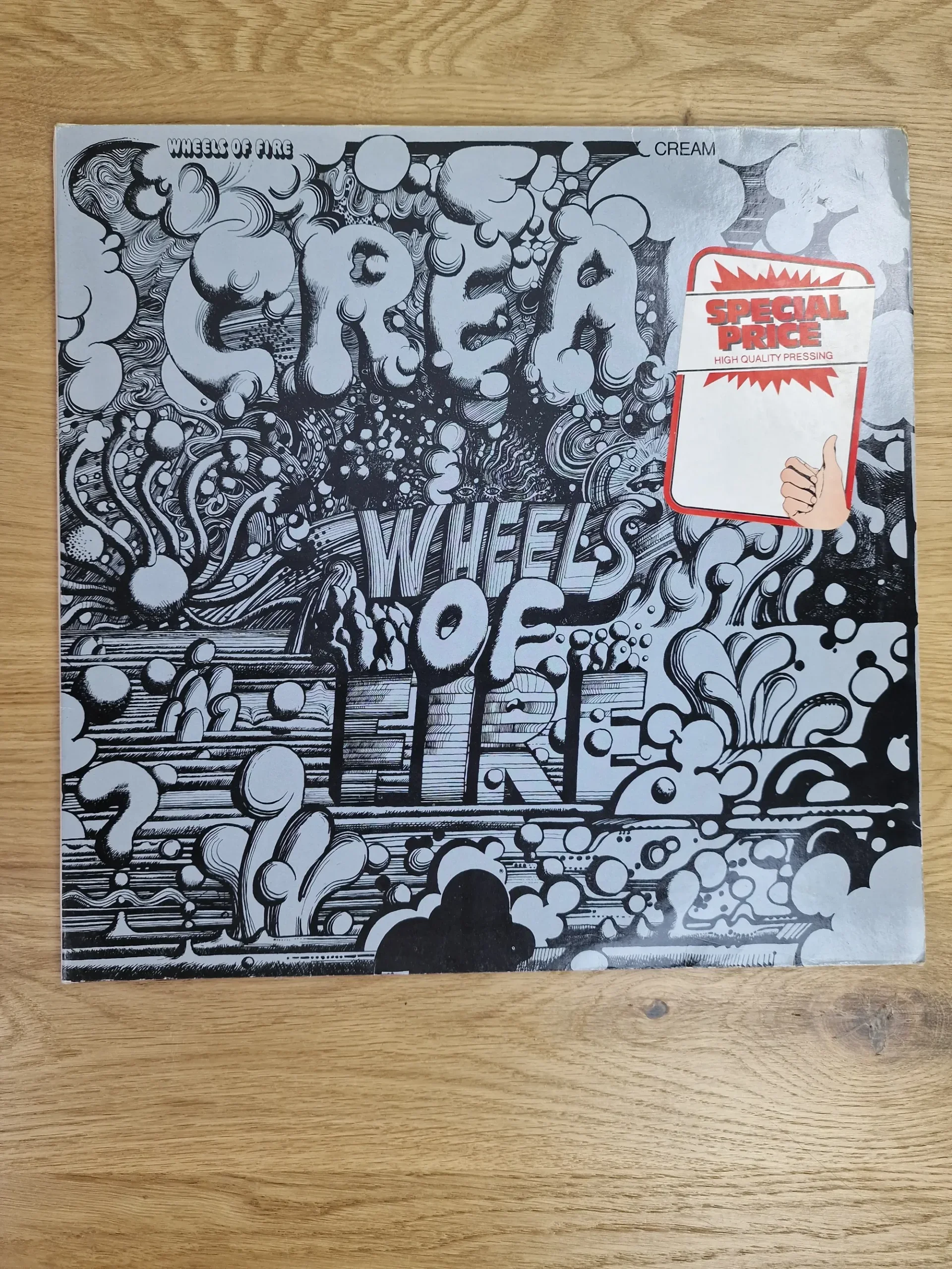 Vorderseite der Vinyl-Schallplatte Wheels of Fire von der Band Cream mit silber-schwarzem Artwork