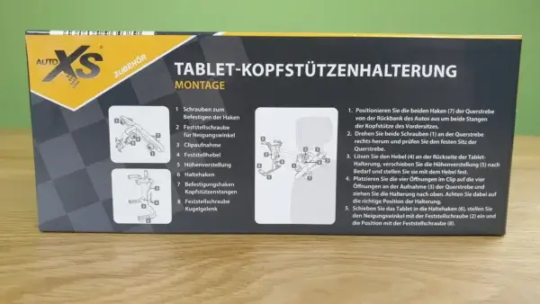 Verpackung der Tablet-Kopfstützenhalterung, geeignet für Tablets mit einer Größe von 8 bis 11 Zoll von der Seite mit der Montageanleitung darauf