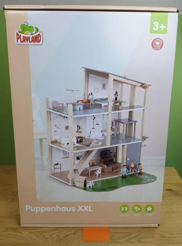 Das Playland Puppenhaus XXL in seiner Verpackung von vorne.