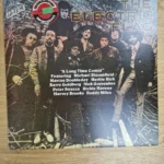 Vorderseite der Vinyl-Schallplatte A Long Time Comin von The Electric Flag mit Bandfoto