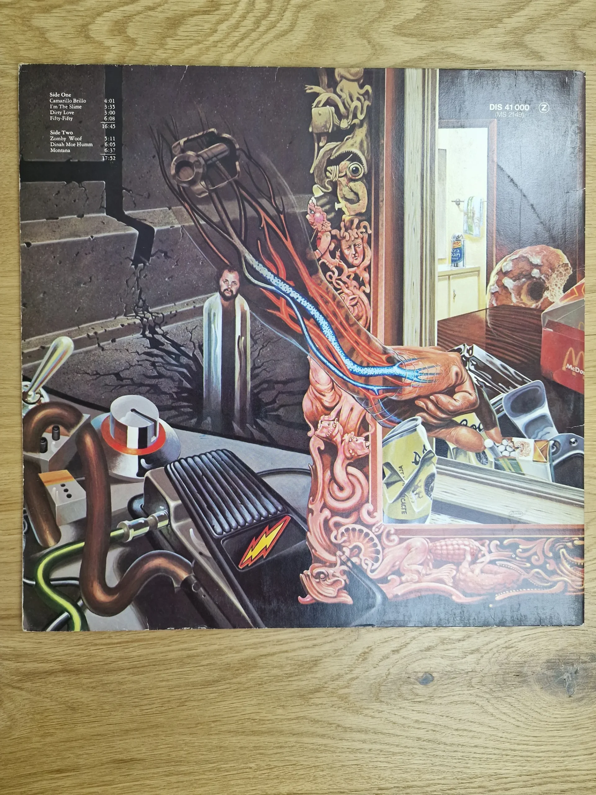 frank-zappa-over-nite-sensation-vinyl-cover-back Rückseite des Albumcovers Over-Nite Sensation mit Tracklist und surrealer Illustration