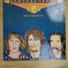 baker-and-band-from-humble-oranges-vinyl-lp-frontcover Vorderseite der Vinyl LP Baker and Band - From Humble Oranges mit Illustrationen von Ginger Baker, Doug Brockie und Karl Hill