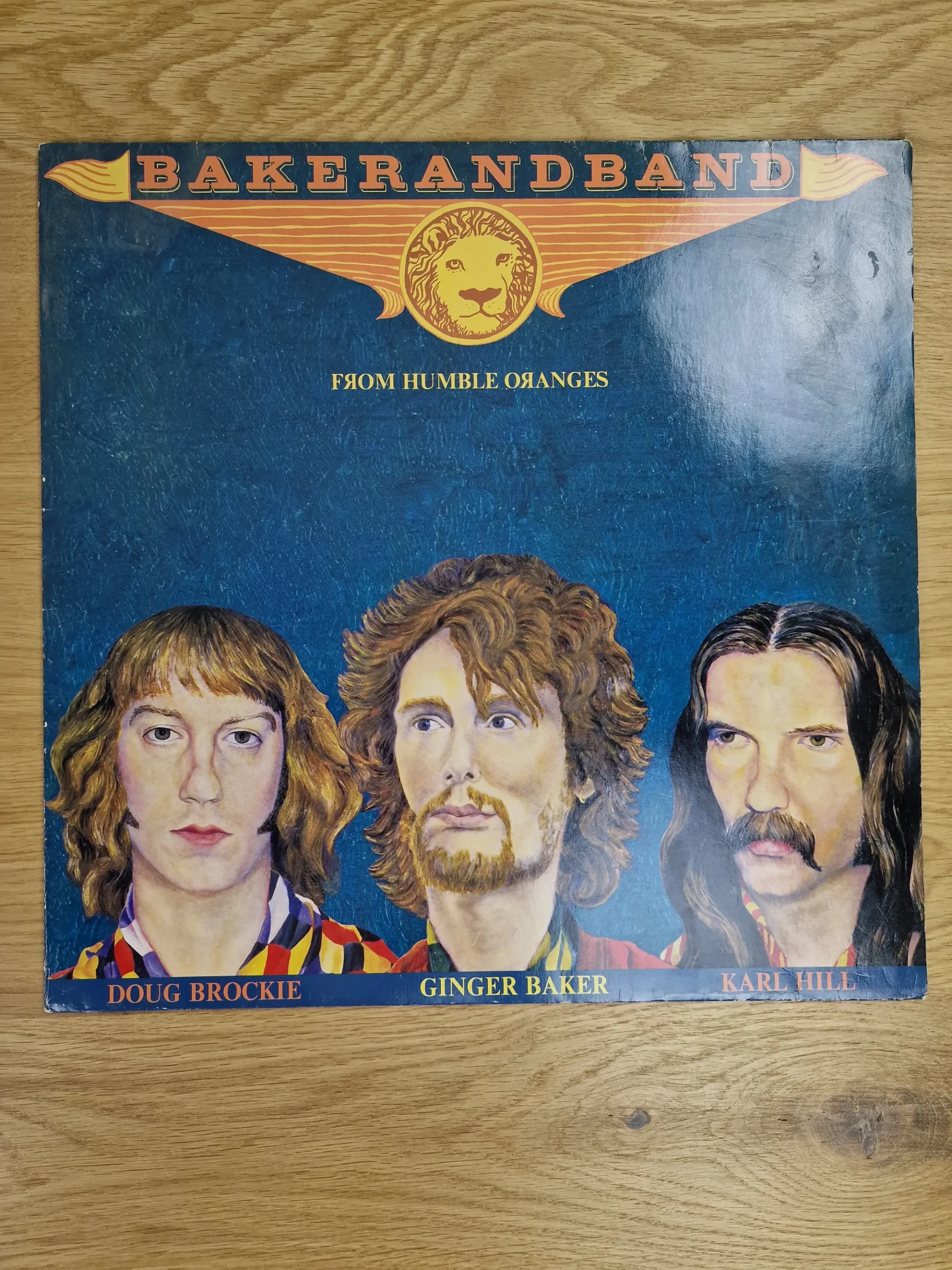 Vorderseite der Vinyl LP Baker and Band - From Humble Oranges mit Illustrationen von Ginger Baker, Doug Brockie und Karl Hill