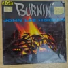 Vorderseite der Vinyl-Schallplatte Burnin' von John Lee Hooker mit Lagerfeuer-Motiv und Joy Records Logo