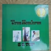 Grünes Cover der ZZ Top Tres Hombres Vinyl LP mit Fotos der Bandmitglieder