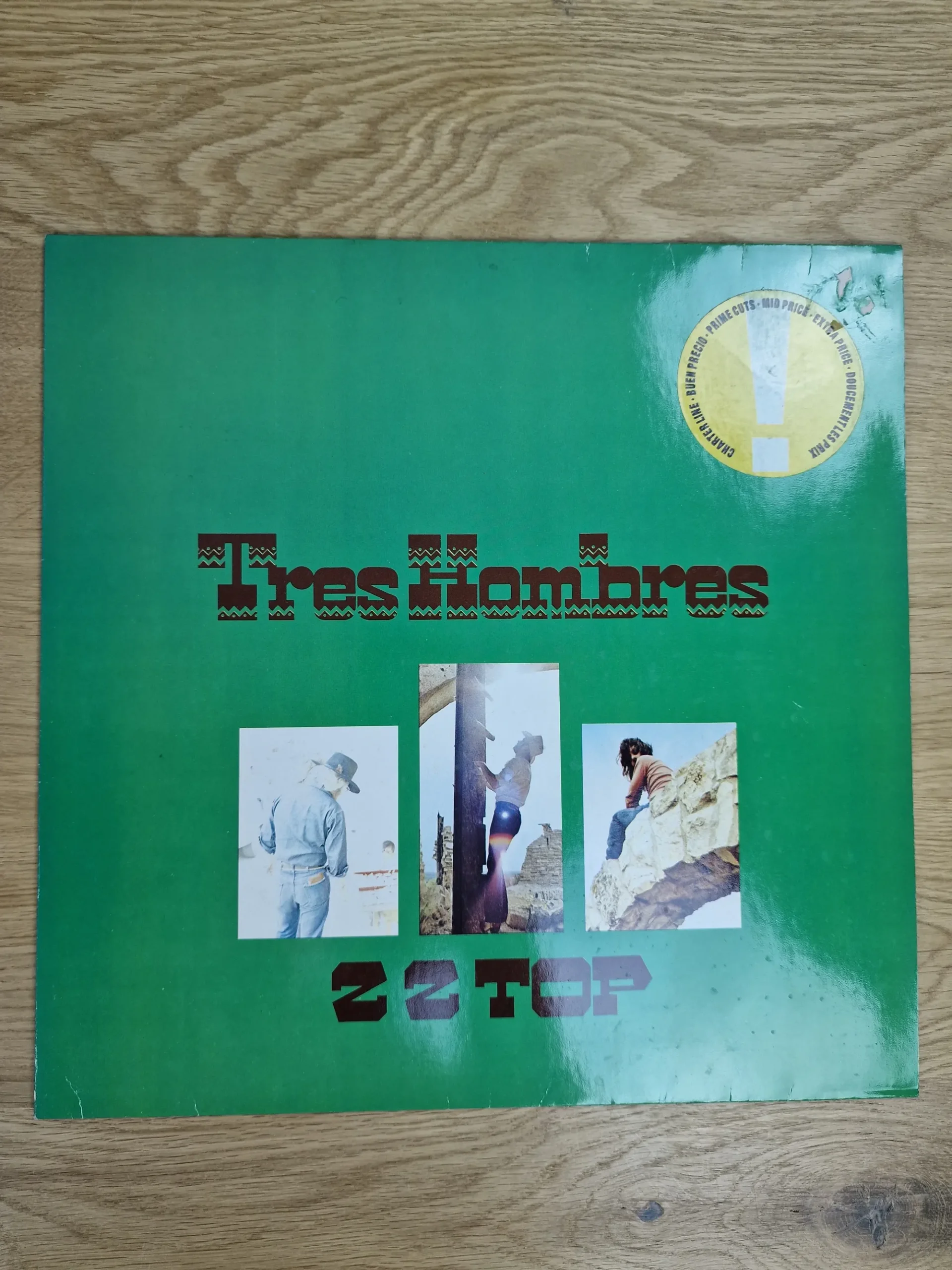 Grünes Cover der ZZ Top Tres Hombres Vinyl LP mit Fotos der Bandmitglieder