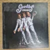 Vorderseite der Vinyl-Schallplatte Goodbye von Cream mit Bandmitgliedern im Silberanzug