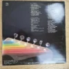 Rückseite des Eric Clapton Backtrackin Vinyl-Albums mit Trackliste und Fender-Gitarre