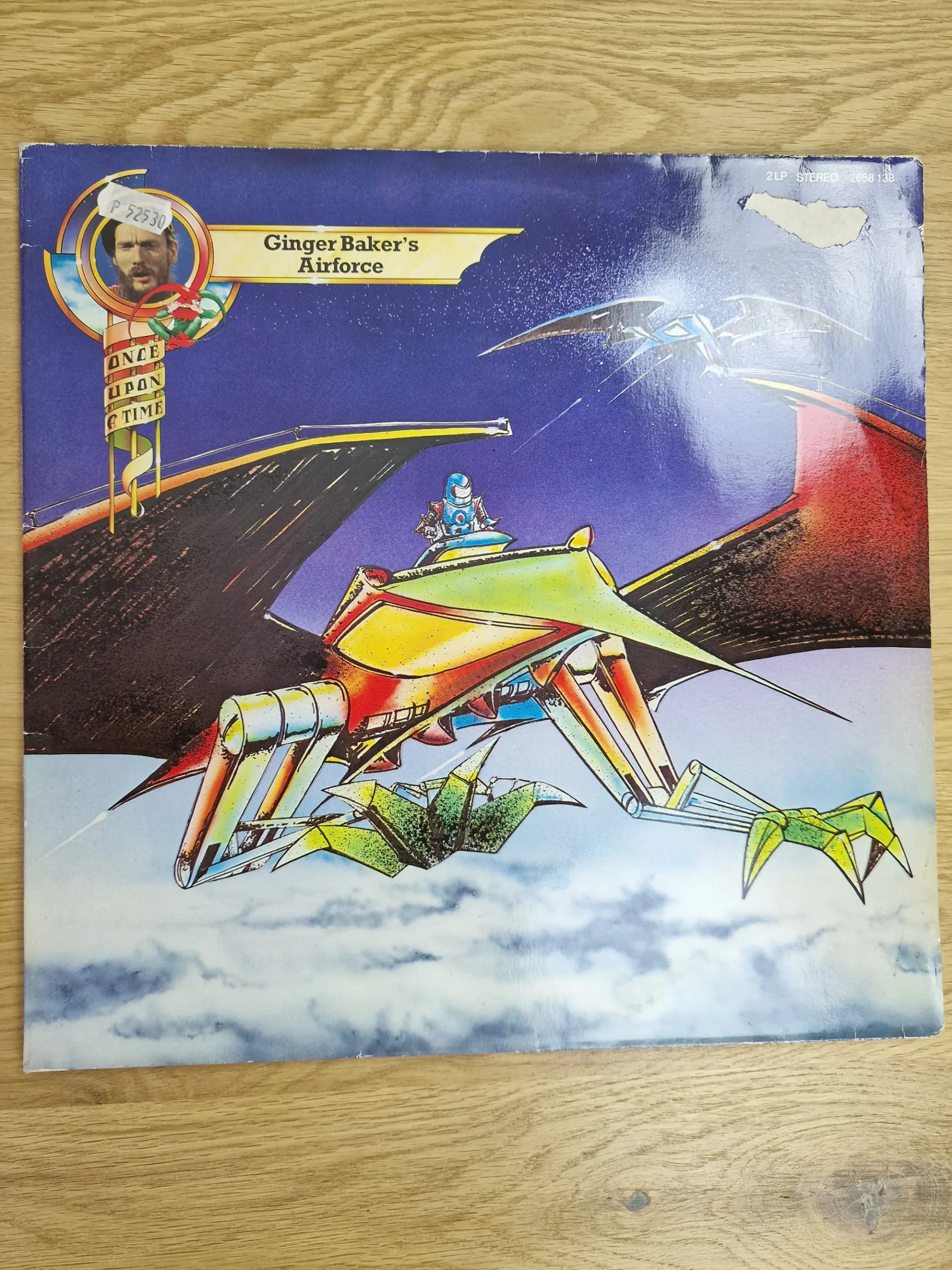 Ginger Baker's Airforce – Once Upon A Time (2LP Doppel-Vinyl Album) 1 Vorderseite der Vinyl-Schallplatte Ginger Baker's Airforce - Once Upon A Time mit Sci-Fi Fantasy Illustration