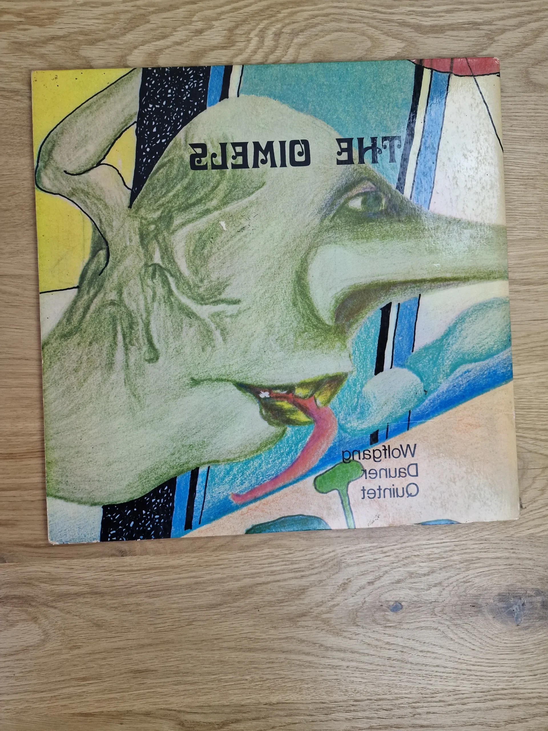 Gespiegelte Detailansicht der Cover-Illustration des Vinyl-Albums The Oimels