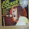 Vorderseite der Vinyl-Schallplatte Joe Cocker Greatest Hits Vol. 1 mit Sing-Porträt