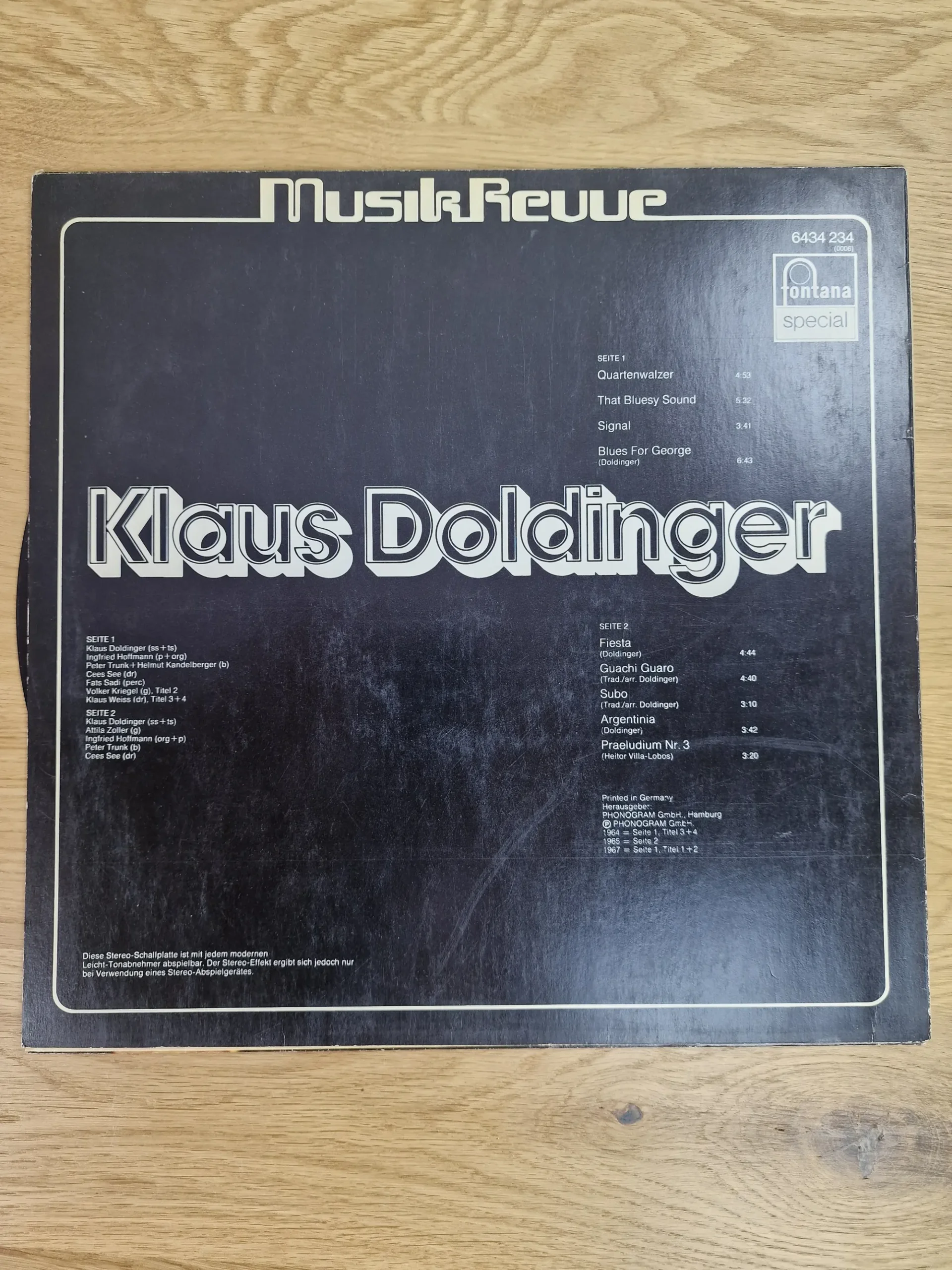 Rückseite des Vinyl-Covers Klaus Doldinger MusikRevue mit Titelliste und Besetzung