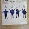Vorderseite der Vinyl-Schallplatte Help! von The Beatles auf Parlophone Label