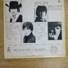 Rückseite der Beatles Help! Vinyl-Hülle mit Trackliste und Porträts der Bandmitglieder