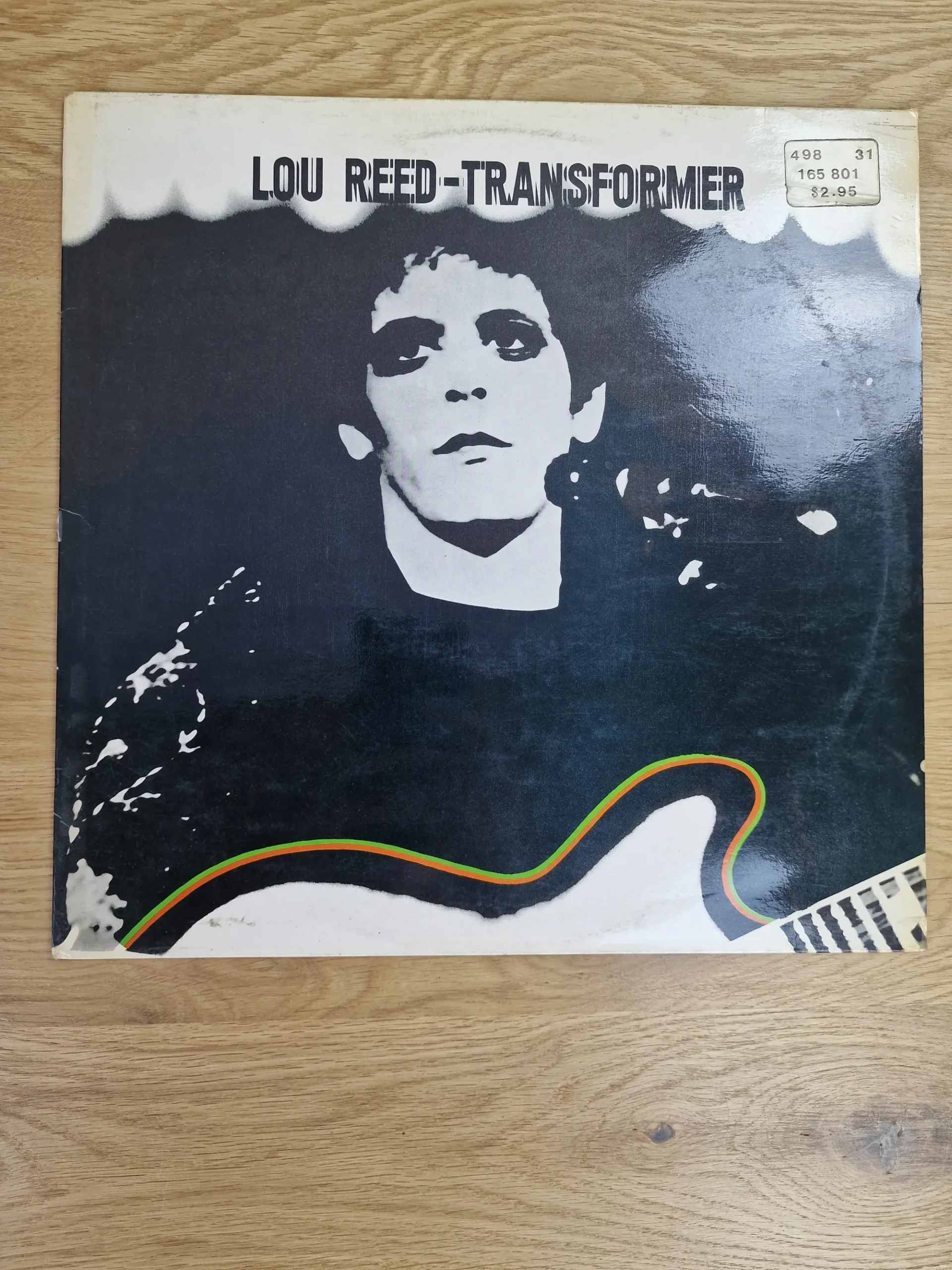Vorderseite des Vinyl-Albumcovers Transformer von Lou Reed mit ikonischem Schwarz-Weiß-Porträt