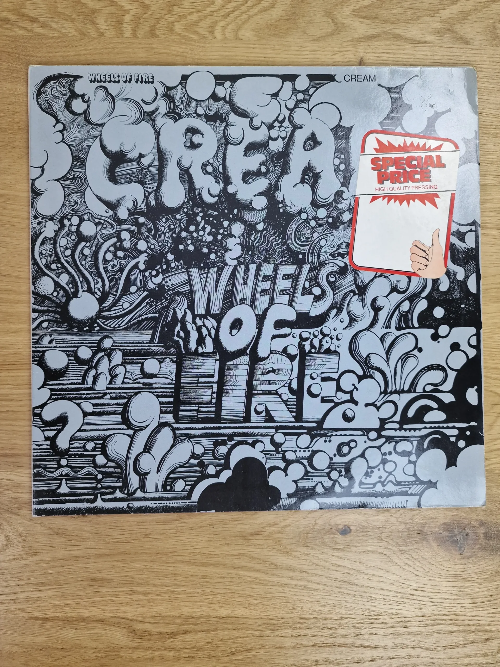 Vorderseite der Vinyl-Schallplatte Wheels of Fire von der Band Cream mit silber-schwarzem Artwork