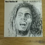 Vorderseite der Vinyl-Schallplatte Best Rarities Of Bob Marley mit gezeichnetem Porträt